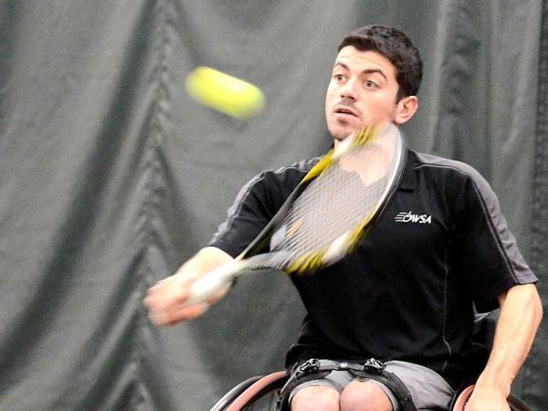 Joel Dembe on the tennis court.